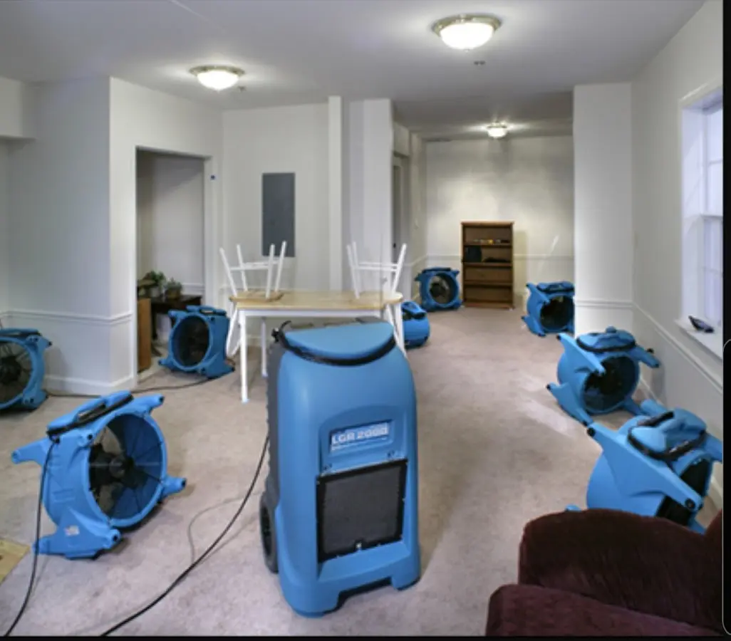 Air movers and dehumidifier setup for Water Damage Restoration in Athol